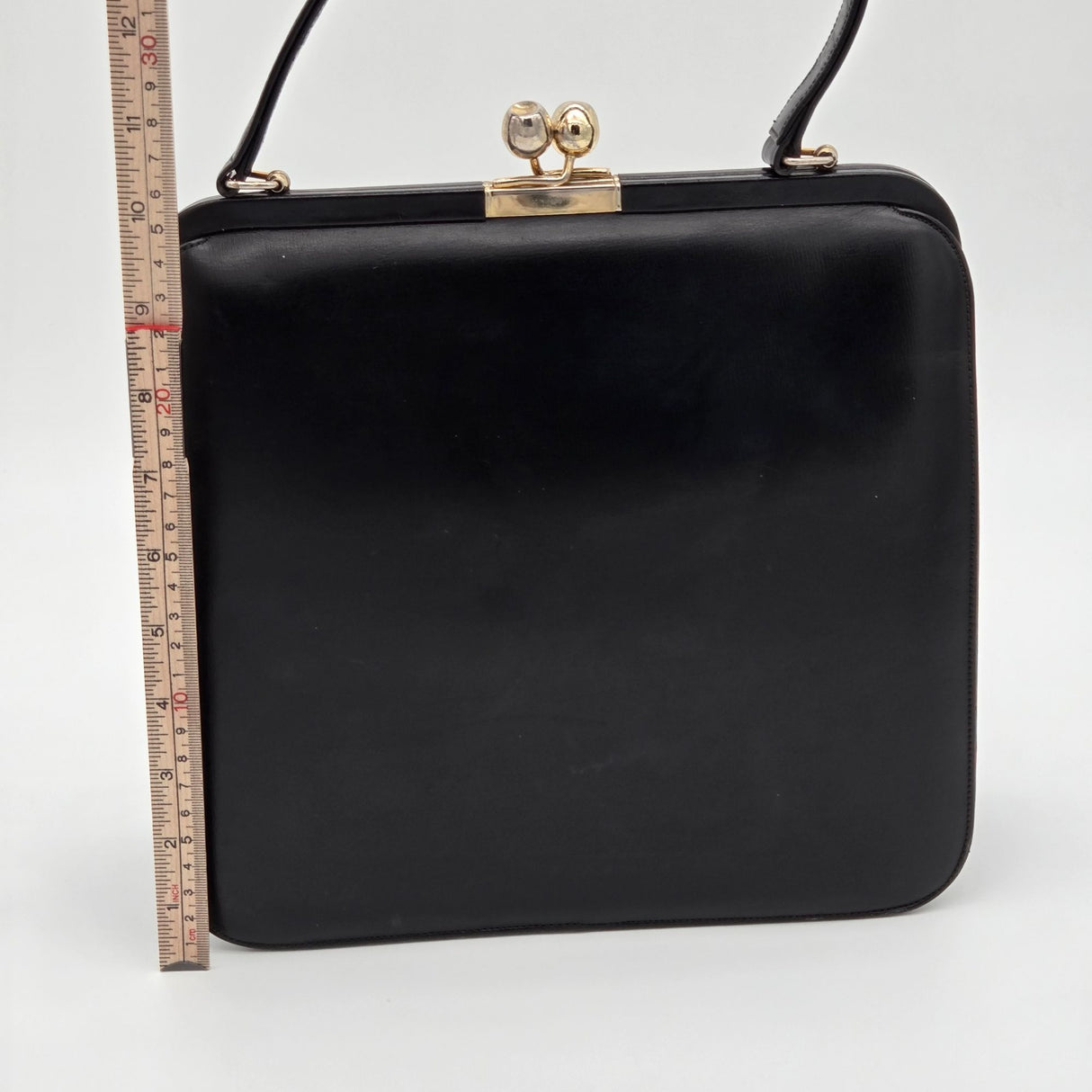 Vintage Black Leather Handbag By Bags By Supreme With Gold Kiss Lock Closure & Genuine Leather Lining