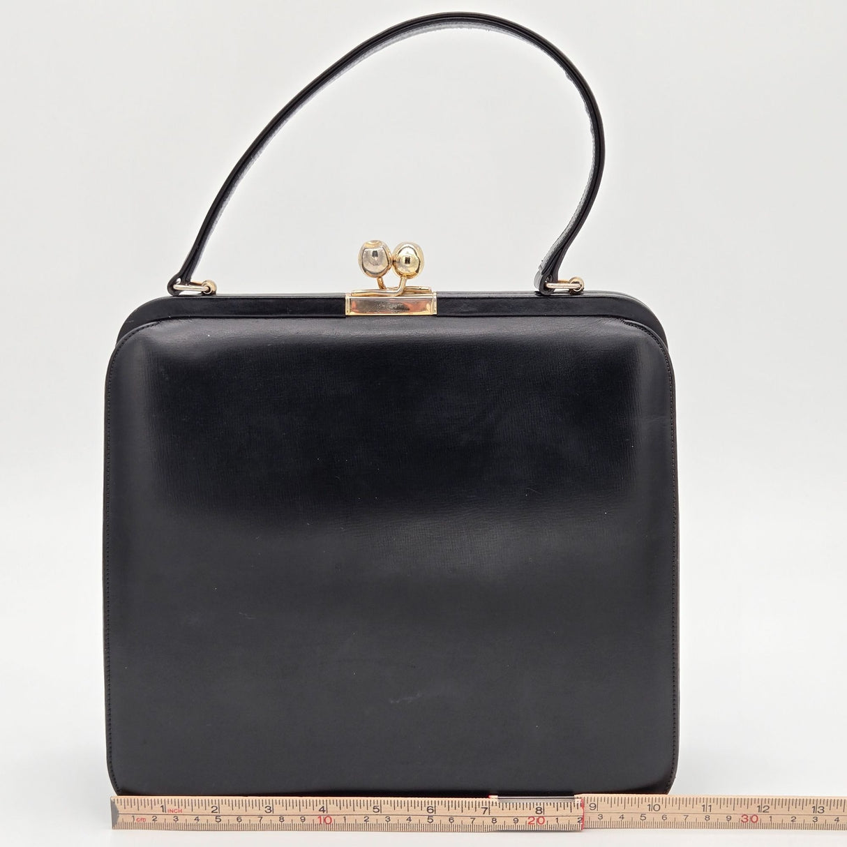 Vintage Black Leather Handbag By Bags By Supreme With Gold Kiss Lock Closure & Genuine Leather Lining