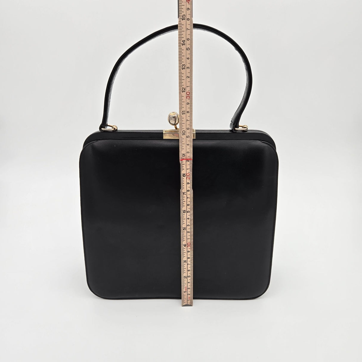 Vintage Black Leather Handbag By Bags By Supreme With Gold Kiss Lock Closure & Genuine Leather Lining