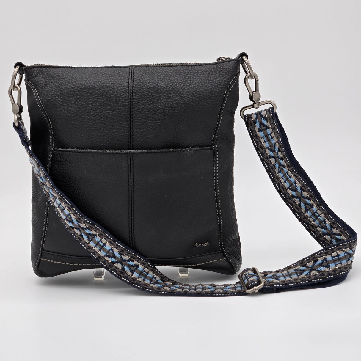 The Sak Black Leather Crossbody Bag With Adjustable Blue Patterned Strap