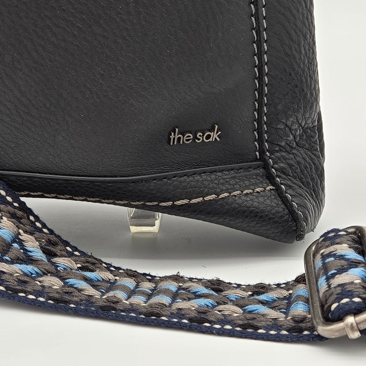 The Sak Black Leather Crossbody Bag With Adjustable Blue Patterned Strap