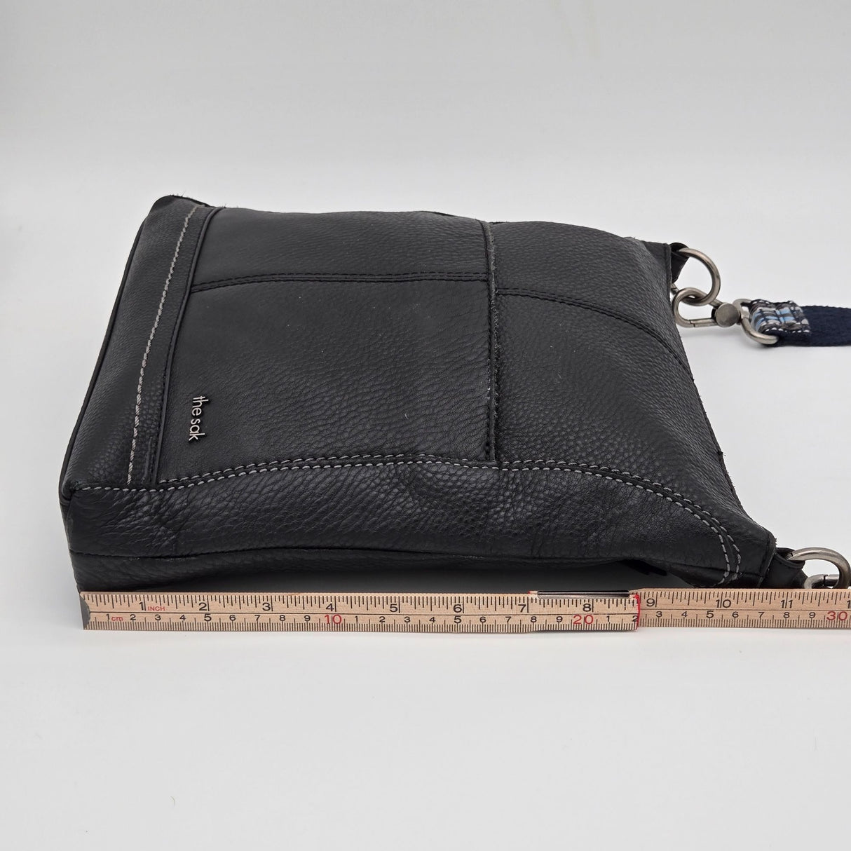 The Sak Black Leather Crossbody Bag With Adjustable Blue Patterned Strap