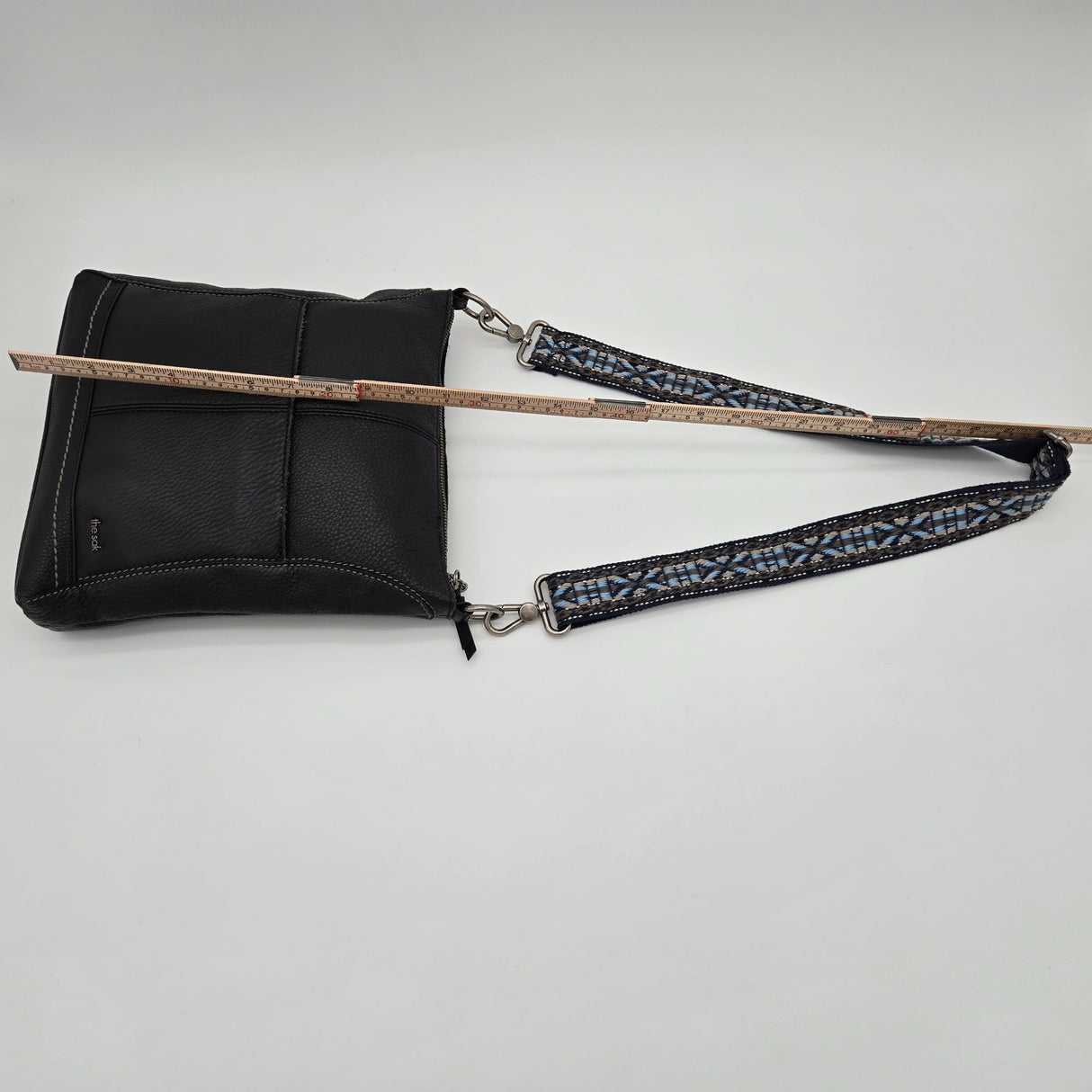 The Sak Black Leather Crossbody Bag With Adjustable Blue Patterned Strap