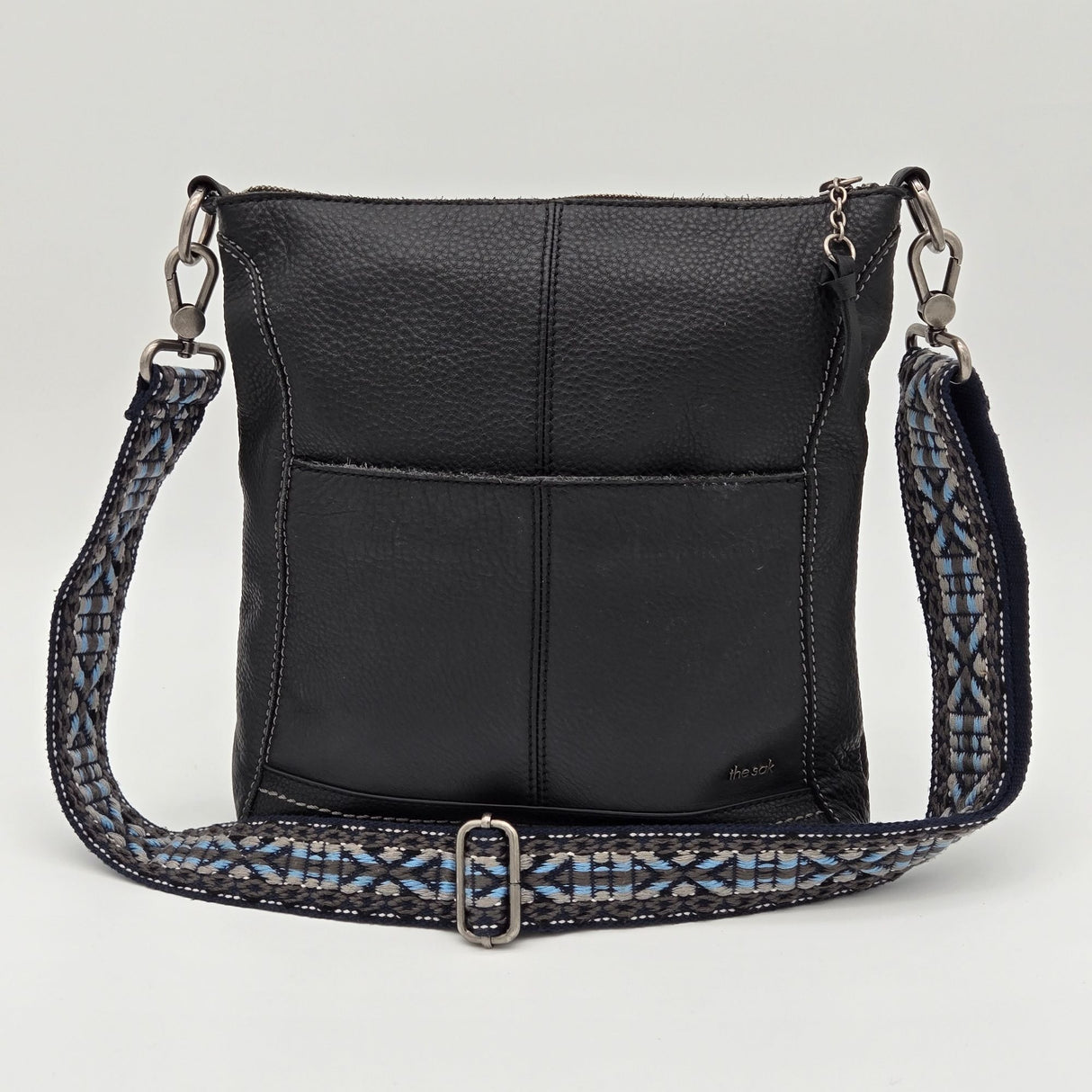 The Sak Black Leather Crossbody Bag With Adjustable Blue Patterned Strap