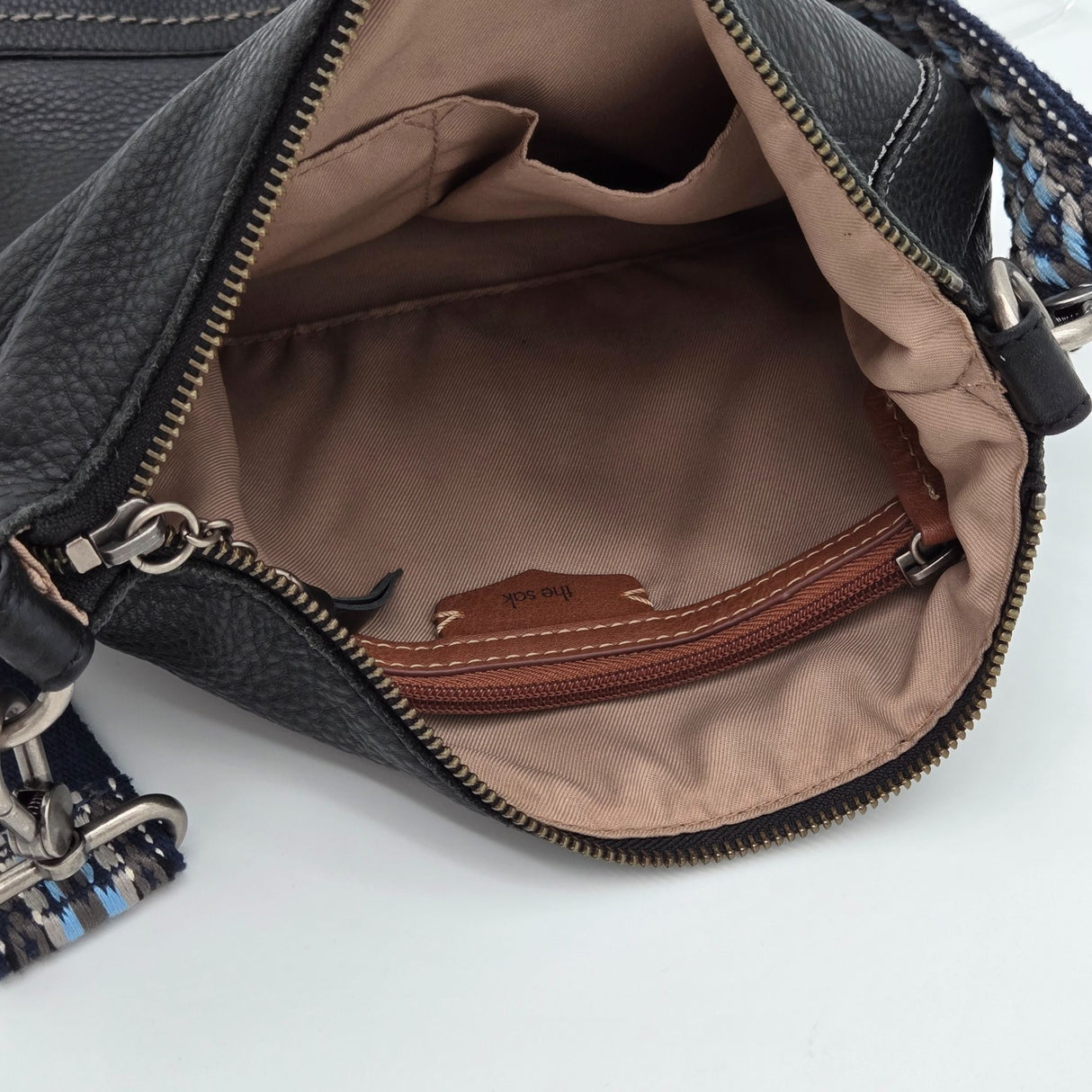 The Sak Black Leather Crossbody Bag With Adjustable Blue Patterned Strap