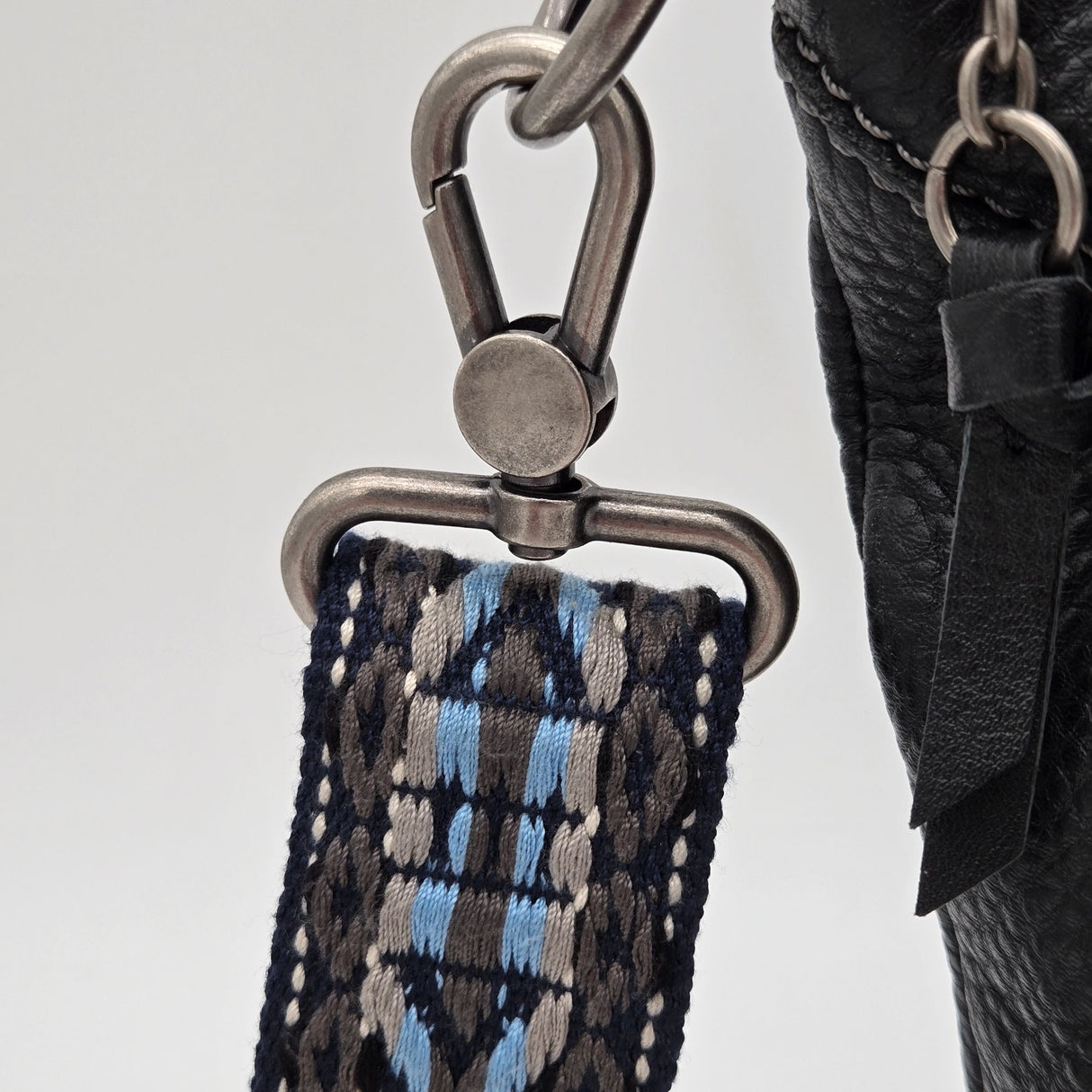 The Sak Black Leather Crossbody Bag With Adjustable Blue Patterned Strap