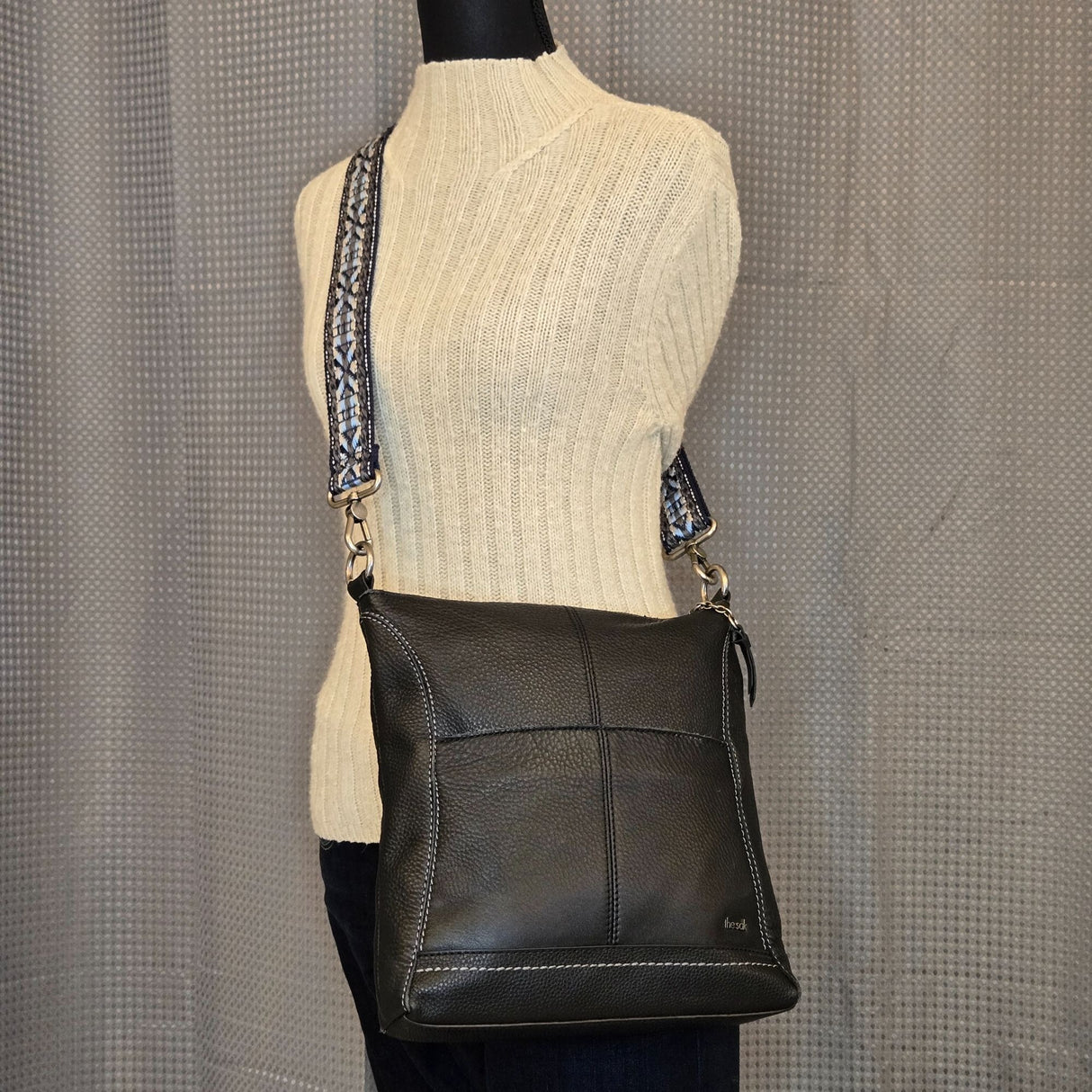 The Sak Black Leather Crossbody Bag With Adjustable Blue Patterned Strap