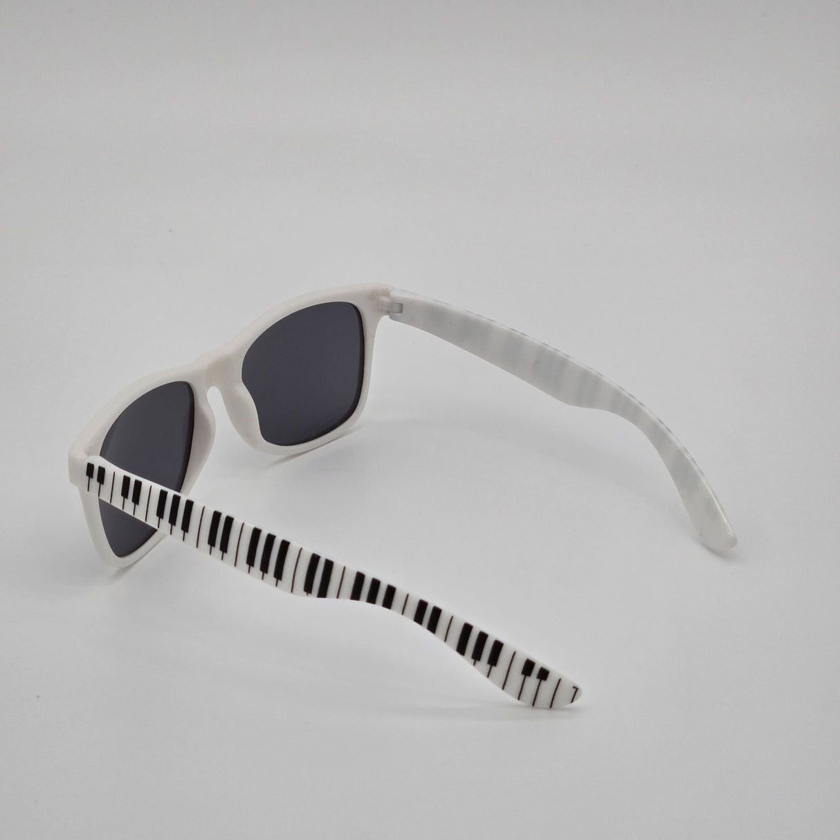 White Retro Sunglasses With Black Piano Key Pattern Arms & Soft Drawstring Pouch