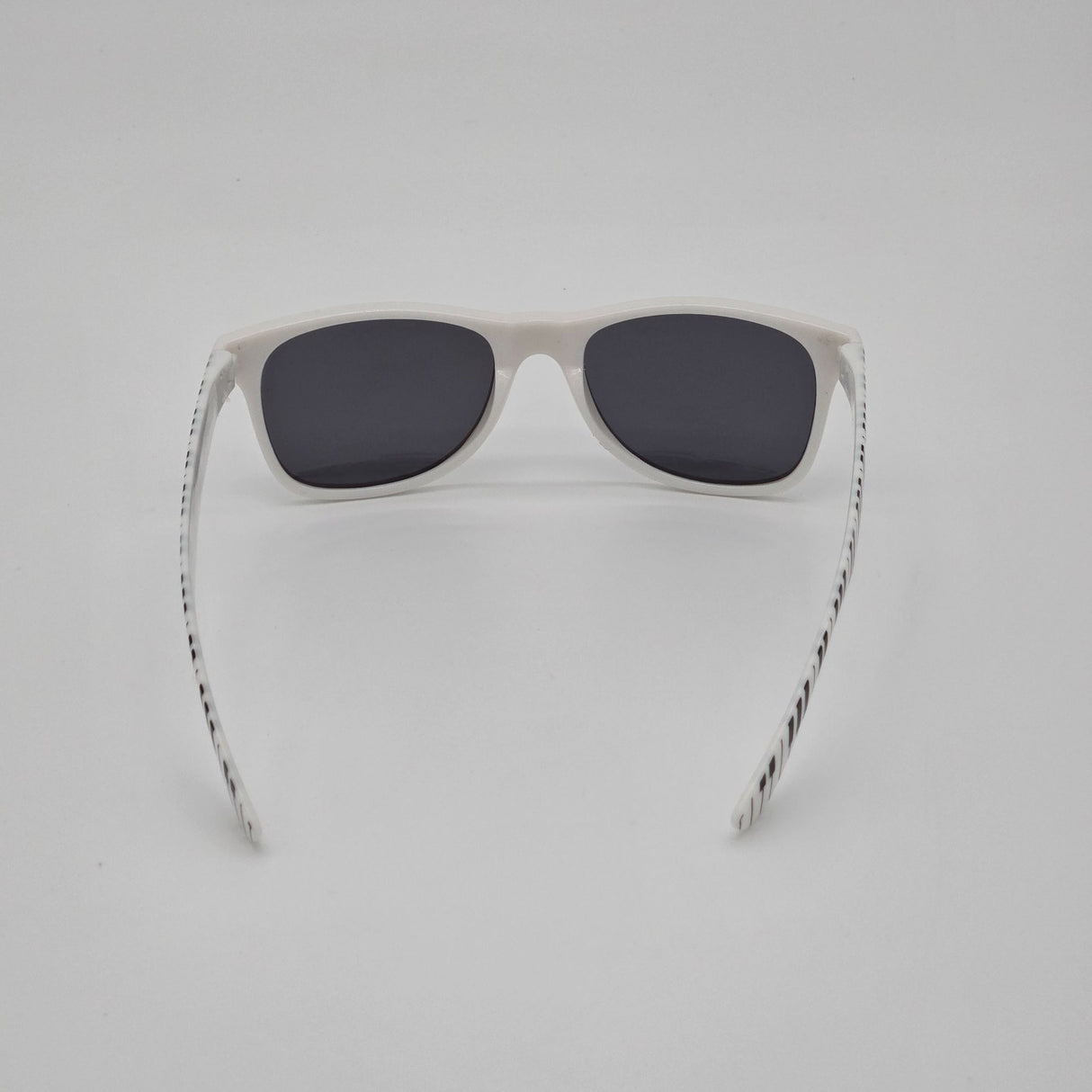 White Retro Sunglasses With Black Piano Key Pattern Arms & Soft Drawstring Pouch