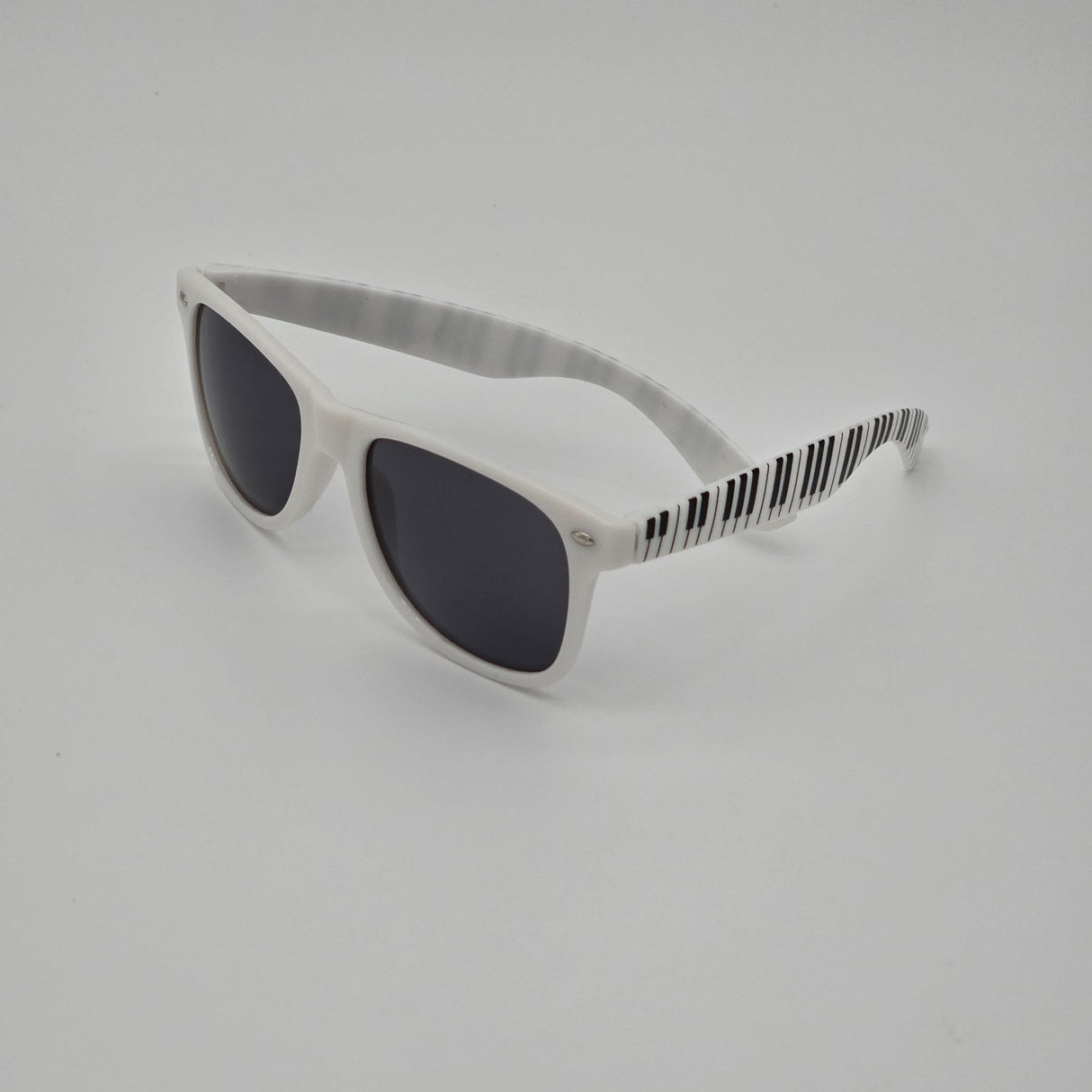 White Retro Sunglasses With Black Piano Key Pattern Arms & Soft Drawstring Pouch